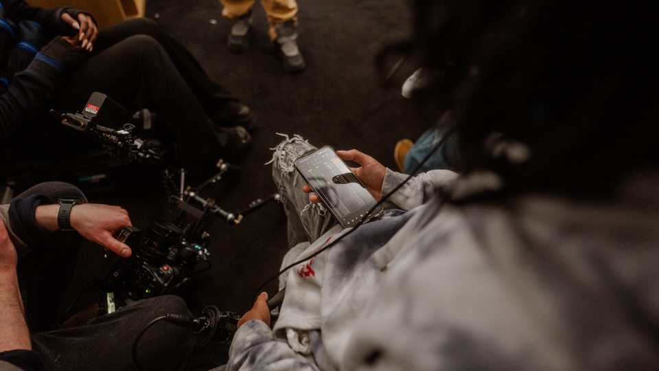 Young crew working with a camera rig, seen from above